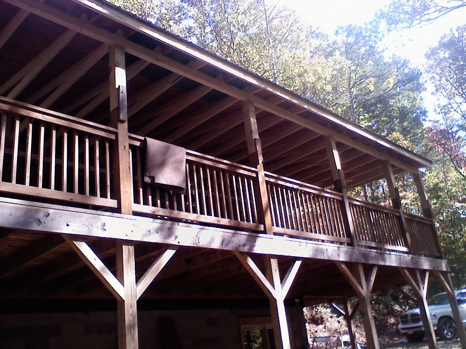 Timber framing under a new elevated porch and deck in Bunker Hill